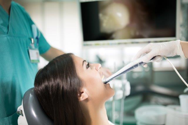 Deciding between root canal and tooth extraction