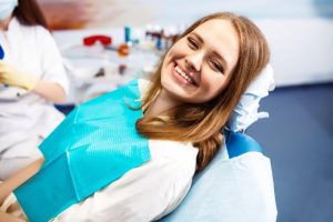 Girl is saving her tooth with root canal treatment